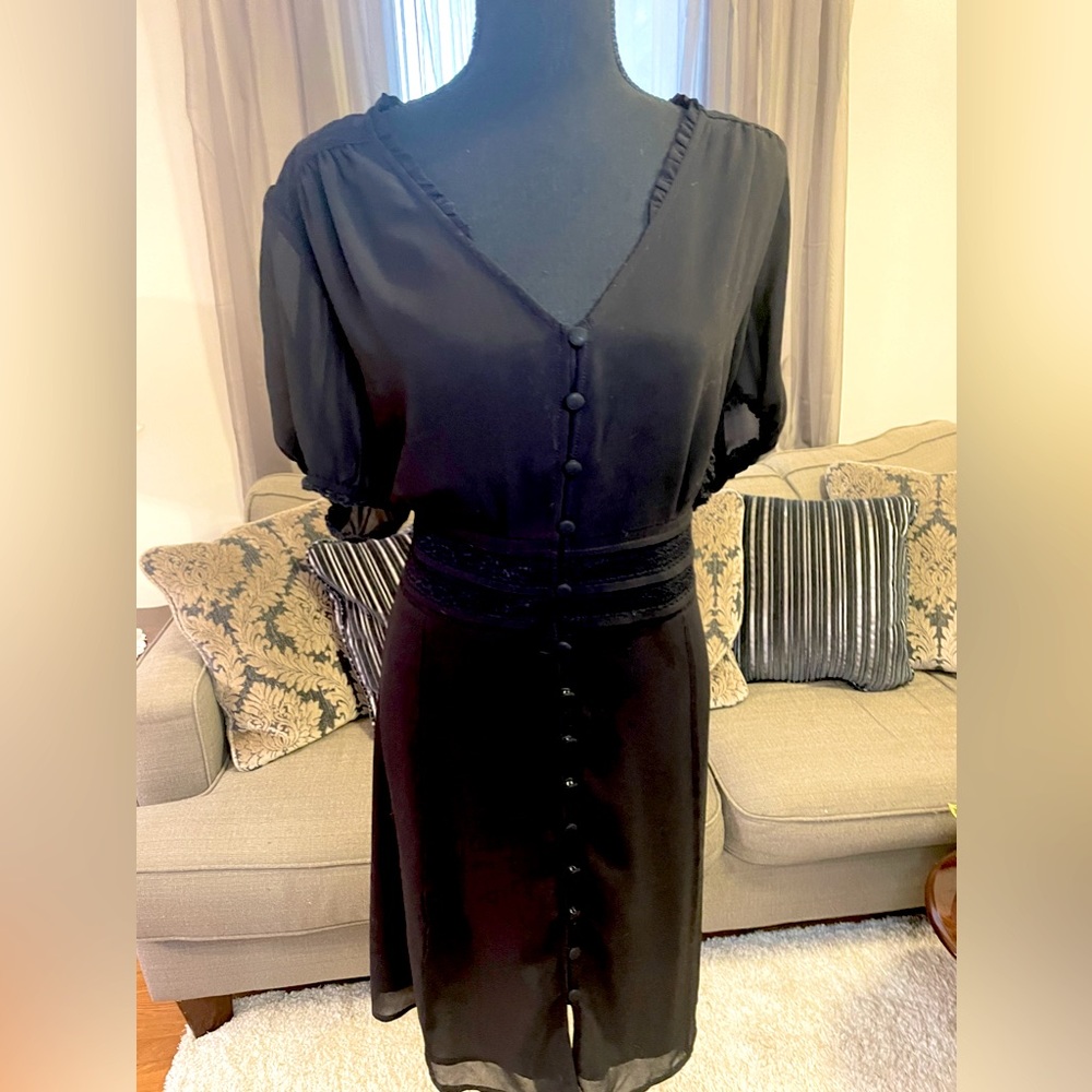 Forever 21 solid black button front dress. Slightly sheer. Size 2X